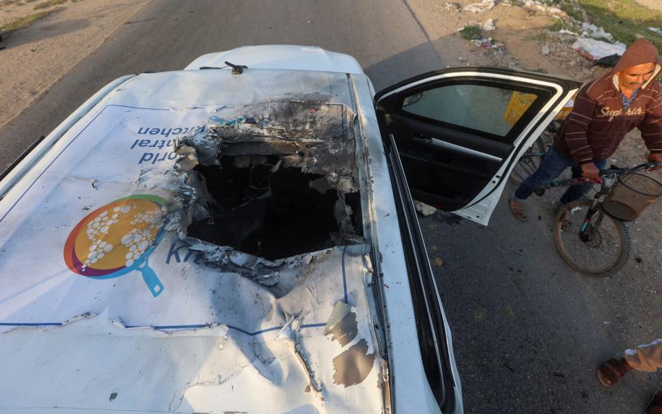 A hole left in the roof of the aid workers' vehicle by the air strike