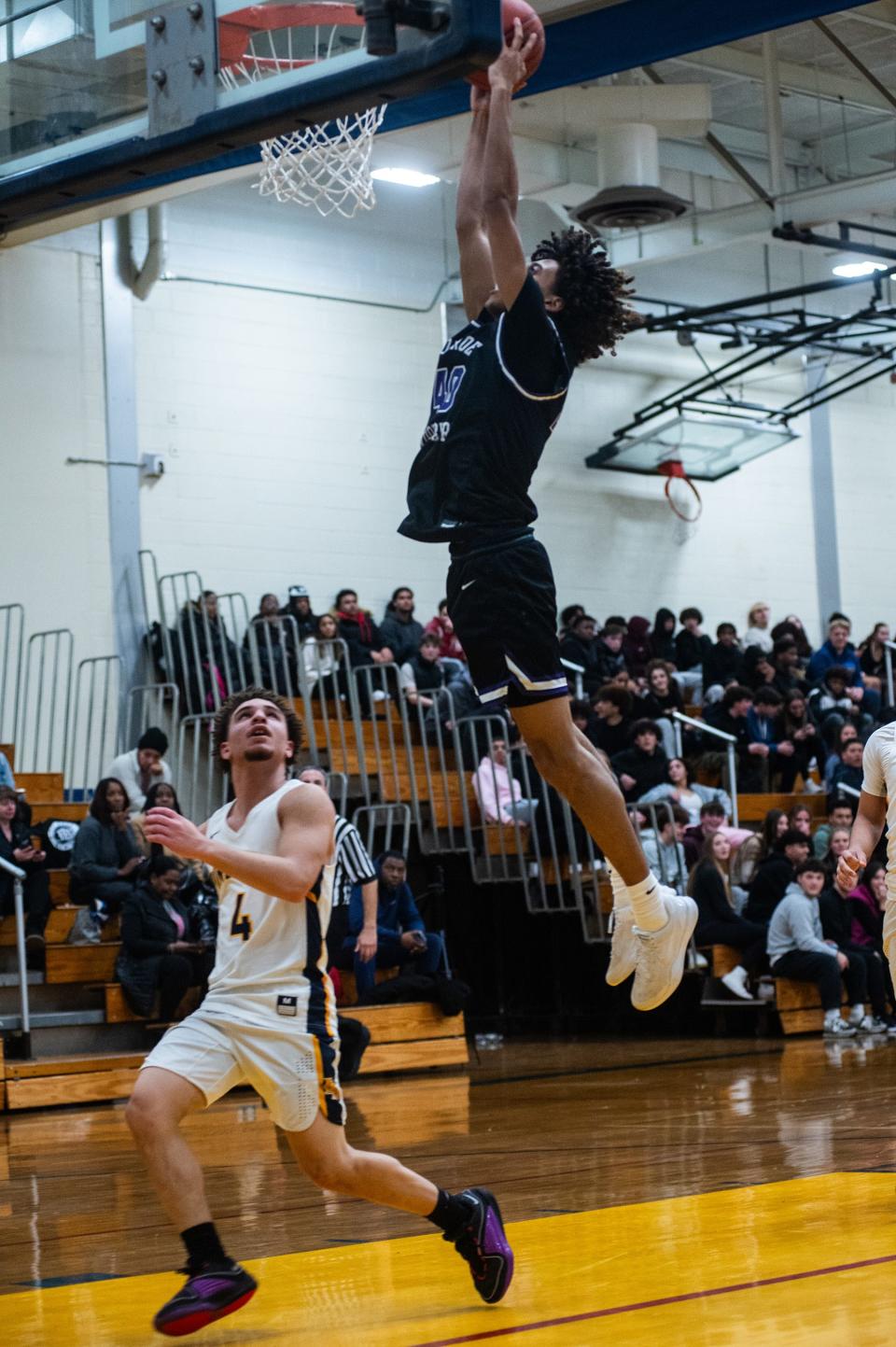 Monroe's Jankarlos Mendoza dunks during the Section 9 boys basketball at Pine Bush High School in Pine Bush, NY on Friday, January 5, 2026. Monroe-Woodbury defeated Pine Bush 94-43. KELLY MARSH/FOR THE TIMES HERALD-RECORD