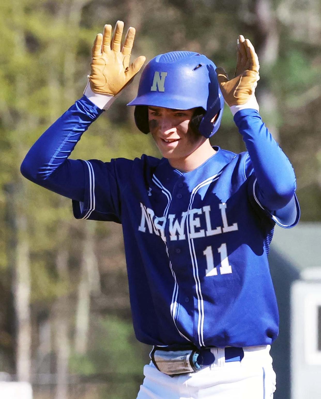 Norwell's Patrick Higgins celebrates his double driving in two runs during a game versus Southeastern on Friday, May 5, 2023. 