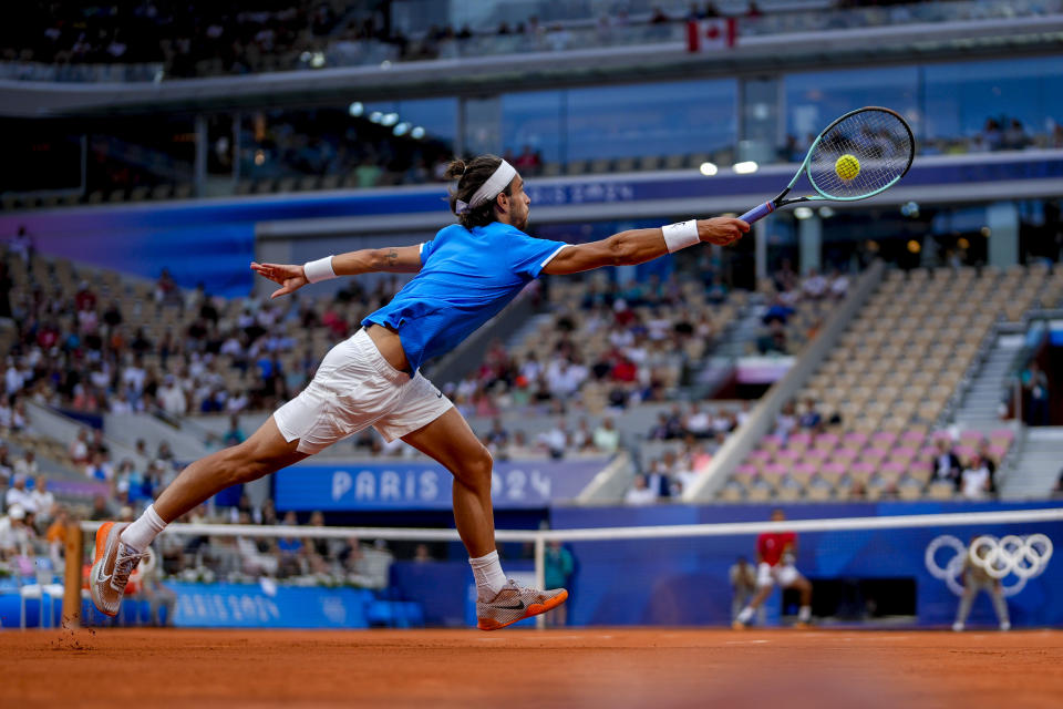 Olympic tennis Lorenzo Musetti of Italy beats Felix AugerAliassime