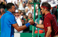 Tennis - Monte Carlo Masters - Monaco, 15/04/2016. Jo-Wilfried Tsonga of France (L) shakes hand with Roger Federer of Switzerland following their match. REUTERS/Eric Gaillard