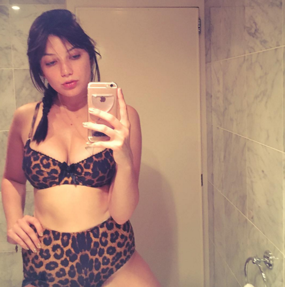 <p>Wearing high waisted leopard print bikini bottoms from Fifi Chachnil and a matching top, the British model gave us all a lesson in dressing for the beach. <i>[Photo: Instagram/Daisy Lowe]</i></p>