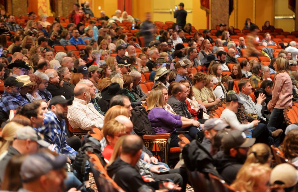 Fans wait for Trace Adkins to perform at the Warner Theatre in November.