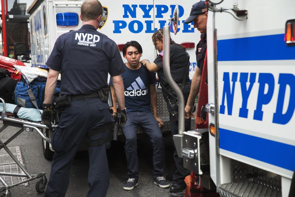 Double-decker tour buses collide in Times Square