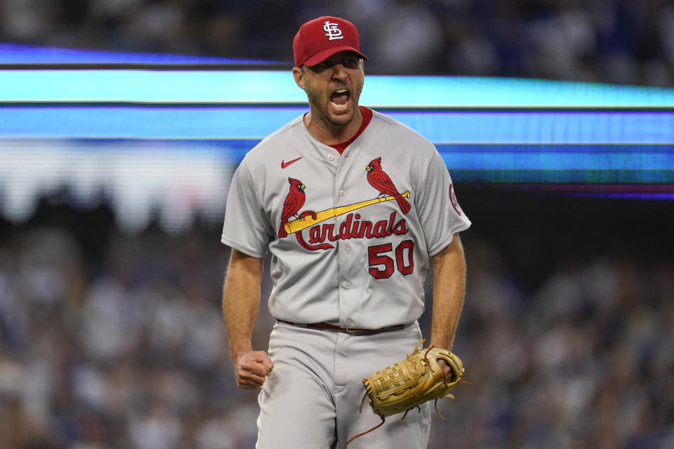 St. Louis Cardinals starting pitcher Adam Wainwright reacts after Los Angeles Dodgers' Trea Turner grounds out in to a double play during the third inning of a National League Wild Card playoff baseball game Wednesday, Oct. 6, 2021, in Los Angeles. (AP Photo/Marcio Jose Sanchez)