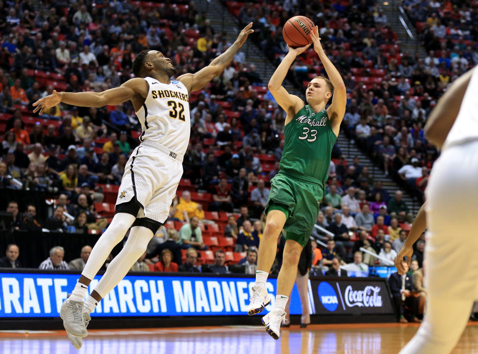 Marshall’s Jon Elmore shoots over Wichita State during the Thundering Herd’s NCAA tournament upset of the Shockers. (Getty)