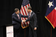 Republican U.S. Senator Ted Cruz, left, and Democratic U.S. Representative Beto O'Rourke, right, shake hands following their first debate for the Texas U.S. Senate in Dallas, Friday, Sept. 21, 2018. (Nathan Hunsinger/The Dallas Morning News via AP, Pool)