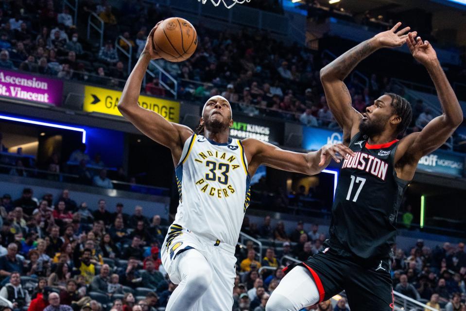 Mar 9, 2023; Indianapolis, Indiana, USA; Indiana Pacers center Myles Turner (33) shoots the ball while Houston Rockets forward Tari Eason (17) defends in the first quarter at Gainbridge Fieldhouse.