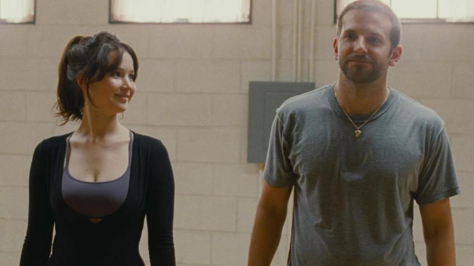 Jennifer Lawrence as Tiffany Maxwell and Bradley Cooper as Patrizio 