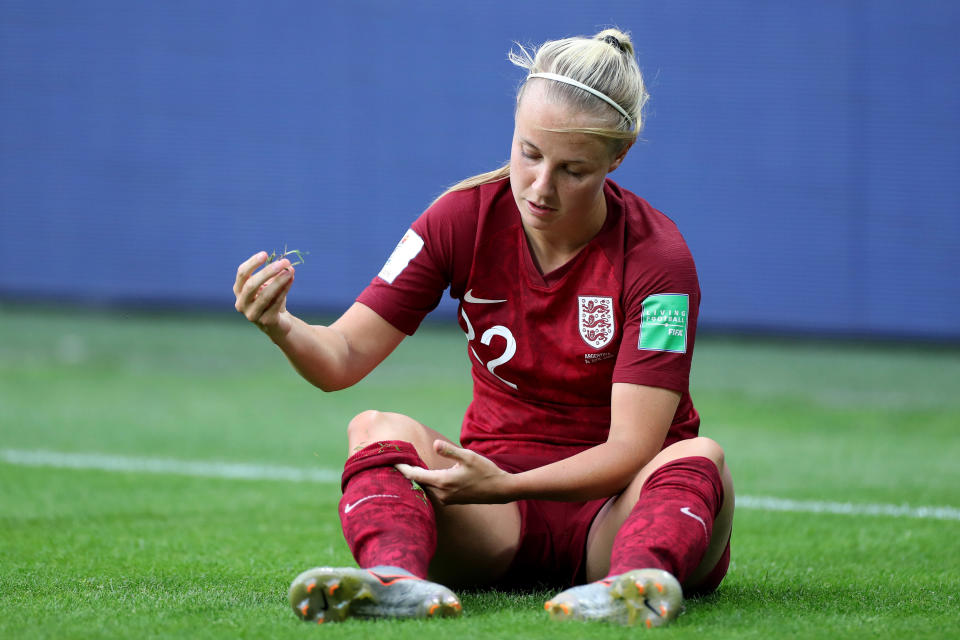 LE HAVRE, FRANCE - JUNE 14: Beth Mead of England pulls  grass out of her socks during the 2019 FIFA Women's World Cup France group D match between England and Argentina at  on June 14, 2019 in Le Havre, France. (Photo by Charlotte Wilson/Offside/Getty Images)