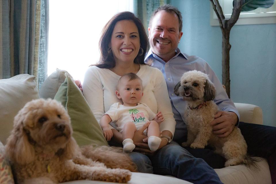 A new Lambert family portrait with baby Brianna and dogs Cali and Ziggy.