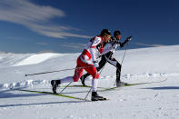 WANAKA, NEW ZEALAND - AUGUST 13: Devon Kershaw of Canada and Andrew Newell of the United States compete in the Cross Country Men's 10km Mass Start during day one of the Winter Games NZ at Snow Farm on August 13, 2011 in Wanaka, New Zealand. (Photo by Hannah Johnston/Getty Images)