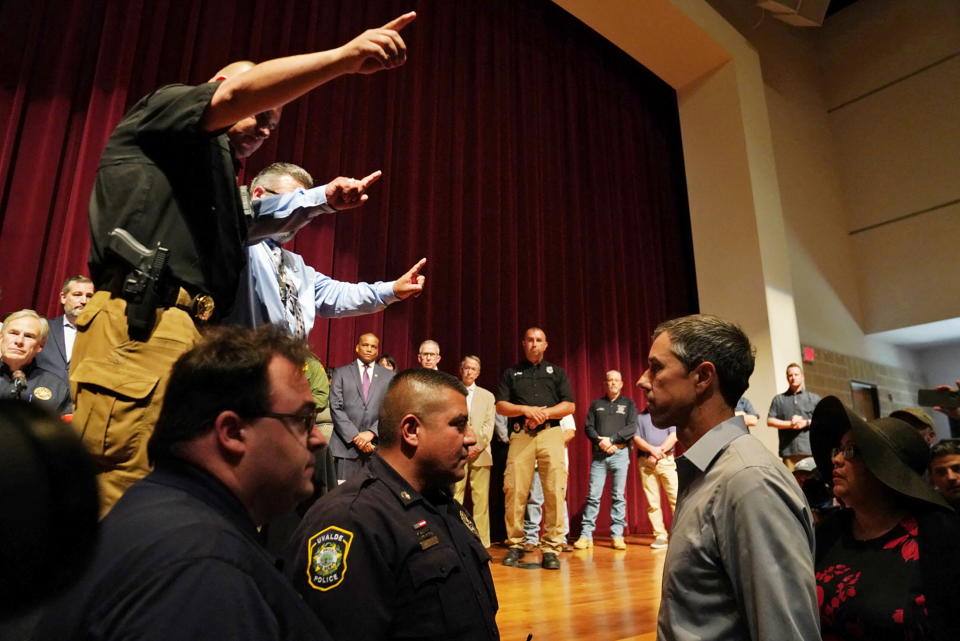 Texas Democratic gubernatorial candidate Beto O'Rourke disrupts a press conference held by Governor Greg Abbott the day after a gunman killed 19 children and two teachers at Robb Elementary school in Uvalde, Texas, U.S. May 25, 2022. REUTERS/Veronica G. Cardenas