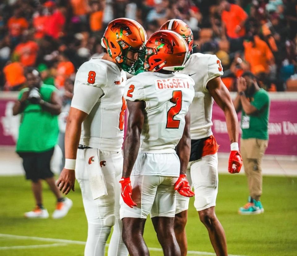 Florida A&M Rattlers quarterback Jeremy Moussa (8) celebrates with wide receiver Jamari Gassett after they connected for a 58-yard touchdown during a Southwestern Athletic Conference game against the Texas Southern Tigers at Shell Energy Stadium in Houston, Texas, Saturday, October 23, 2023.