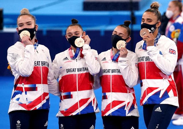 Alice Kinsella, Amelie Morgan, Jennifer Gadirova and Jessica Gadirova celebrate 