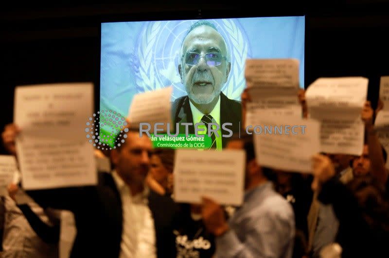 <div class="inline-image__caption"><p>"Ivan Velasquez, Commissioner of the International Commission against Impunity in Guatemala (CICIG) is seen speaking on a screen as people protest against the CICIG's latest report in Guatemala City, Guatemala August 20, 2019. REUTERS/Luis Echeverria"</p></div>