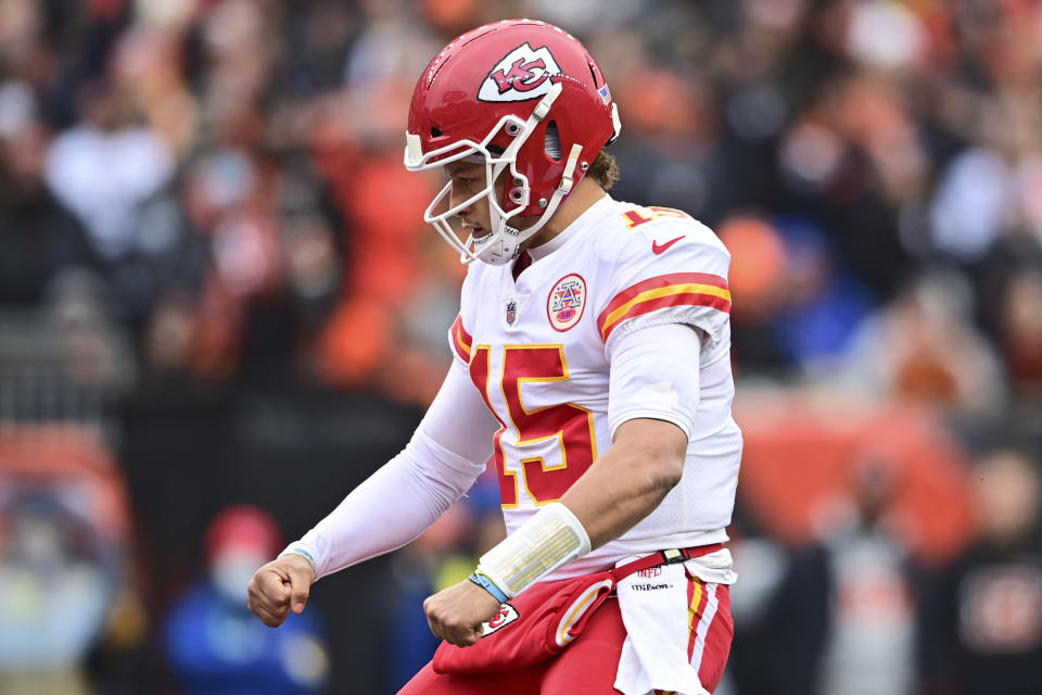 Kansas City Chiefs quarterback Patrick Mahomes (15) celebrates a 1-yard touchdown by running back Darrel Williams during the first half of an NFL football game against the Cincinnati Bengals, Sunday, Jan. 2, 2022, in Cincinnati. (AP Photo/David Dermer)