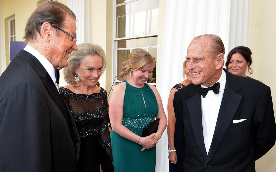 Sir Roger Moore with Prince Philip at the Duke of Edinburgh Award 60th Anniversary Diamonds are Forever Gala in Buckinghamshire last year - Credit: REX/Shutterstock