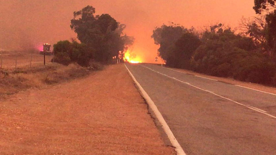 Fire burning near the road in Mogumber, north of Perth