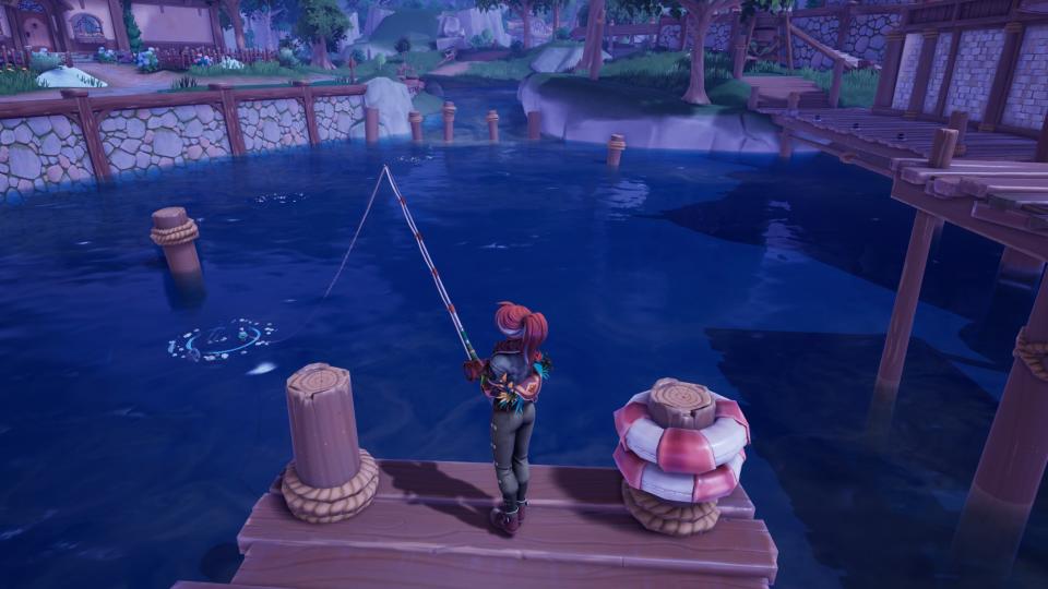 Palia - a player holds a fishing rod at night, cast into a bubbling white fishing spot nearby