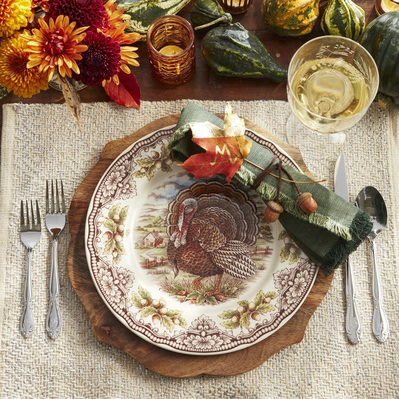 <p>As Thanksgiving Day approaches, you're probably wondering, "How can I decorate my house for Thanksgiving?" It can seem like a challenge, along with planning the perfect <a href="https://www.countryliving.com/food-drinks/g637/thanksgiving-menus/" rel="nofollow noopener" target="_blank" data-ylk="slk:Thanksgiving menu" class="link ">Thanksgiving menu</a>. This year, put your creativity and crafting know-how to use to make an inviting, unique fall scenes. From rustic <a href="https://www.countryliving.com/entertaining/g634/thanksgiving-table-settings-1108/" rel="nofollow noopener" target="_blank" data-ylk="slk:Thanksgiving table settings" class="link ">Thanksgiving table settings</a> to easy <strong>Thanksgiving decorating ideas</strong> for your living and dining room, there's a new idea in here for just about every host—regardless of personal style or taste. Twirl up <a href="https://www.countryliving.com/entertaining/g2130/thanksgiving-centerpieces/" rel="nofollow noopener" target="_blank" data-ylk="slk:Thanksgiving centerpieces" class="link ">Thanksgiving centerpieces</a> to delight all your dinner guests, make charming ice buckets out of fake reusable pumpkins, a table runner out of vintage grain sacks, or string together miniature wreaths with which to decorate your candles. When it comes to DIY decor, the possibilities are endless! </p><p>Looking for outdoor Thanksgiving decorations, too? We've got a ton of those: Our Thanksgiving <a href="https://www.countryliving.com/diy-crafts/g2610/fall-door-decorations/" rel="nofollow noopener" target="_blank" data-ylk="slk:door decorations" class="link ">door decorations</a> and <a href="https://www.countryliving.com/diy-crafts/g1988/fall-craft-projects/" rel="nofollow noopener" target="_blank" data-ylk="slk:fall wreaths" class="link ">fall wreaths</a> are an easy way to refresh your front porch and make a lasting impression on your guests before they even set foot inside. Of course, on Thanksgiving, the dining room table should be considered the crown jewel of your home. That's why we've put so much thought into Thanksgiving decoration ideas that'll delight your entire family—even your youngest kids. Whether you're looking for a fun kraft paper tablecloth, a printable banner, or an inexpensive arrangement, we've got you an idea we know you'll love. </p>