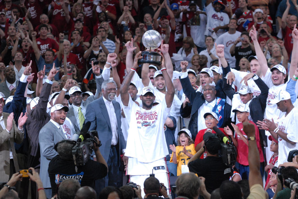 CLEVELAND - JUNE 2: LeBron James #23 of the Cleveland Cavaliers holds the Eastern Conference Championship trophy after defeating the Detroit Pistons in Game Six of the Eastern Conference Finals during the 2007 NBA Playoffs on June 2, 2007 at the Quicken Loans Arena in Cleveland, Ohio.&nbsp;