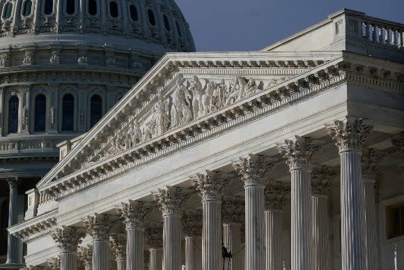 Sunlight shines on the U.S. Senate wing of the Capitol building on Capitol Hill