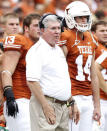 FILE PHOTO - University of Texas head coach Mack Brown (L) and quarterback David Ash watch from the sideline against the University of Oklahoma in the first half of their NCAA Big 12 football game played at the Cotton Bowl in Dallas, Texas October 8, 2011. REUTERS/Mike Stone