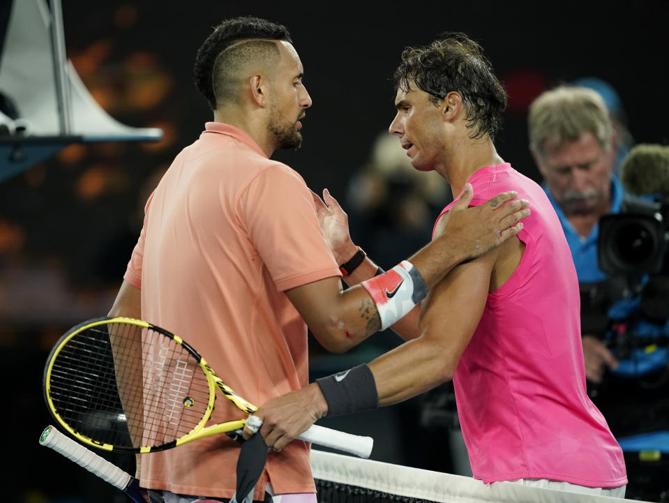 Spain's Rafael Nadal and Australia's Nick Kyrgios pat their shoulders after the match. (Reuters)