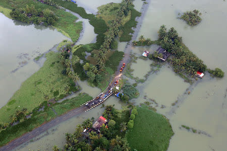 An aerial view shows partially submerged road at a flooded area in the southern state of Kerala, India, August 19, 2018. REUTERS/Sivaram V