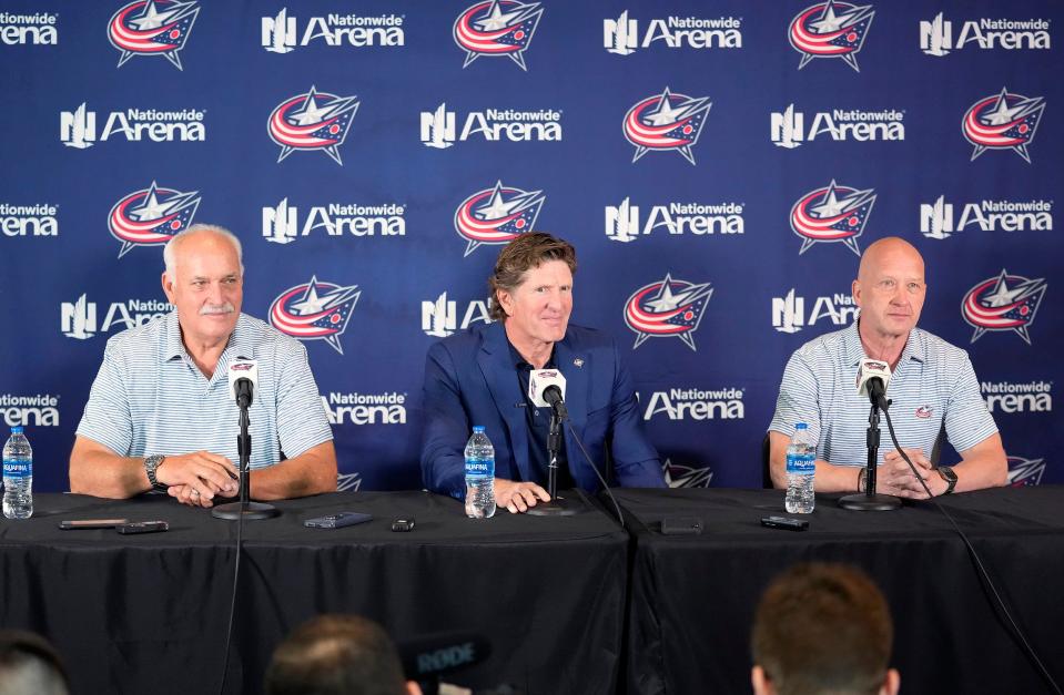 Jul 1, 2023; Columbus, Ohio, United States; Columbus Blue Jackets introduce Mike Babcock, center, as the new head coach during a press conference at Nationwide Arena. Mandatory Credit: Kyle Robertson-The Columbus Dispatch