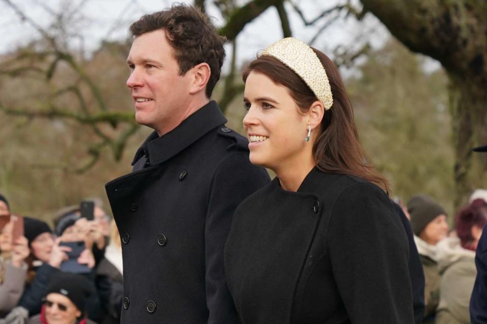 <p>Joe Giddens/PA Images via Getty</p> Jack Brooksbank and Princess Eugenie attend Christmas 2023