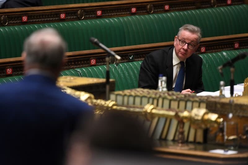 Britain's Chancellor of the Duchy of Lancaster Michael Gove looks on during a debate at the House of Commons in London