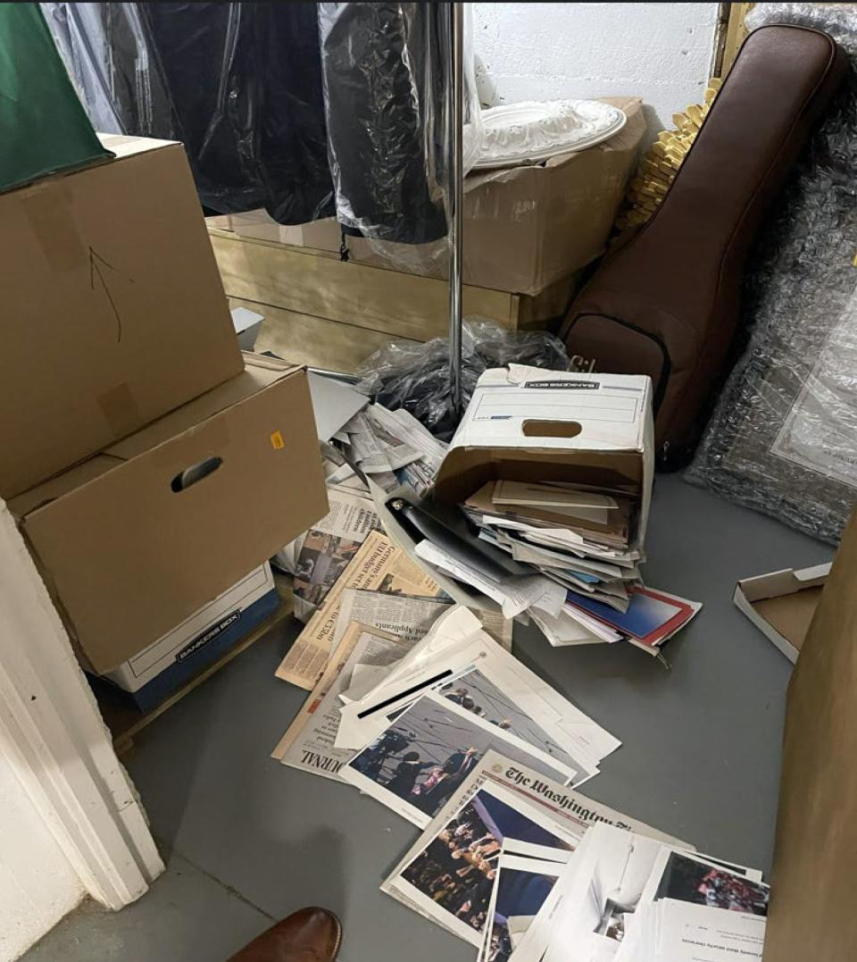 This image, contained in the indictment against former President Donald Trump, shows boxes of records on Dec. 7, 2021, in a storage room at Trump’s Mar-a-Lago estate in Palm Beach, Fla., that had fallen over with contents spilling onto the floor. Trump is facing 37 felony charges related to the mishandling of classified documents according to an indictment unsealed Friday, June 9, 2023. | Justice Department via Associated Press