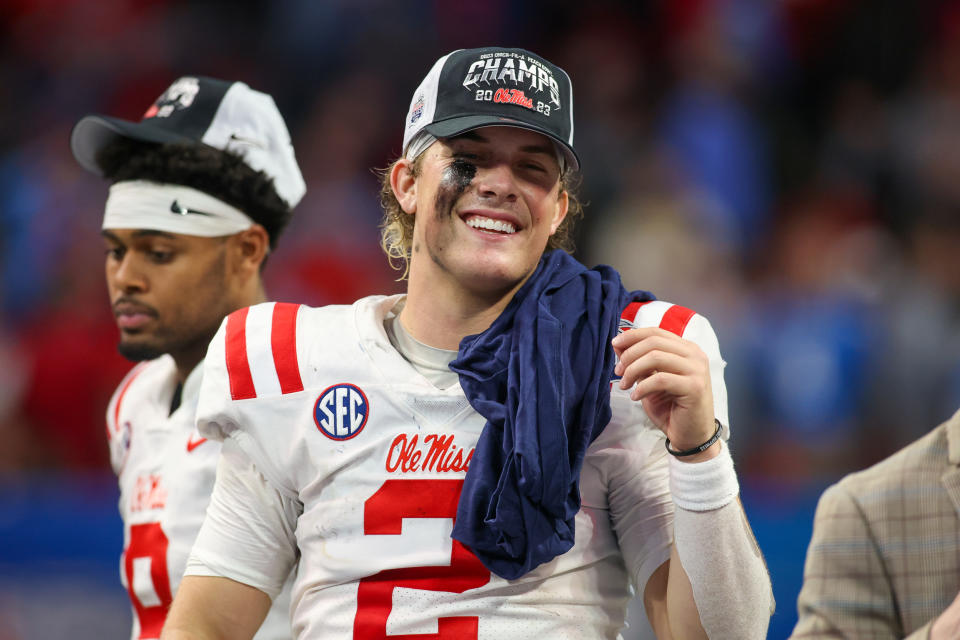 Dec 30, 2023; Atlanta, GA, USA; Mississippi Rebels quarterback <a class="link " href="https://sports.yahoo.com/ncaaf/players/322381/" data-i13n="sec:content-canvas;subsec:anchor_text;elm:context_link" data-ylk="slk:Jaxson Dart;sec:content-canvas;subsec:anchor_text;elm:context_link;itc:0">Jaxson Dart</a> (2) celebrates after a victory against the Penn State Nittany Lions in the Peach Bowl at Mercedes-Benz Stadium. Mandatory Credit: Brett Davis-USA TODAY Sports