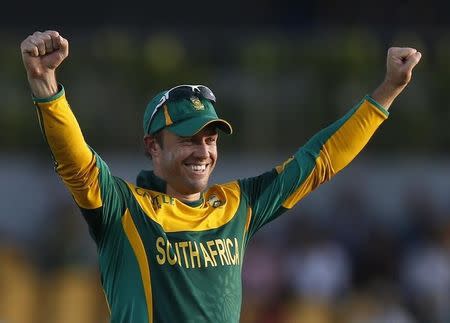 South Africa's captain AB de Villiers celebrates after winning the One Day International cricket series against Sri Lanka, at the final match in Hambantota July 12, 2014. REUTERS/Dinuka Liyanawatte