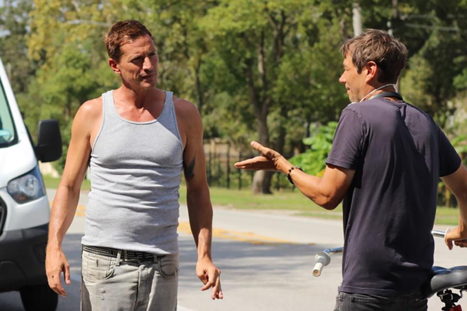 <div class="inline-image__caption"><p>Sean Baker directs Simon Rex on the set of <em>Red Rocket</em></p></div> <div class="inline-image__credit">A24</div>