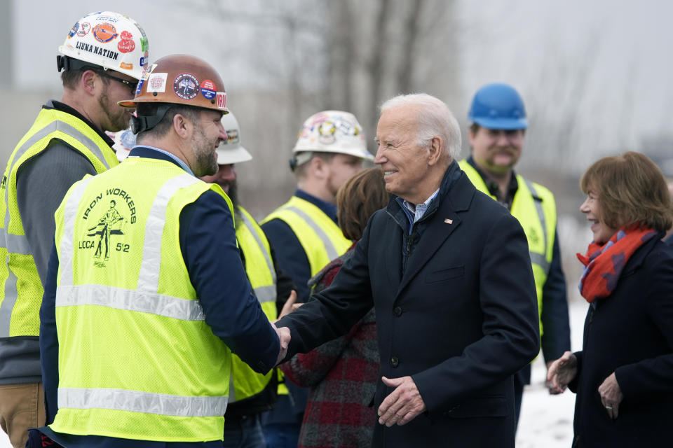 President Biden speaks with ironworkers near the John A. Blatnik Bridge between Minnesota and Wisconsin on Thursday, Jan. 25, 2024, in Superior, Wisconsin. / Credit: Alex Brandon / AP