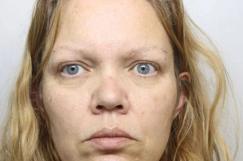 A police mug shot of Fiona Beal