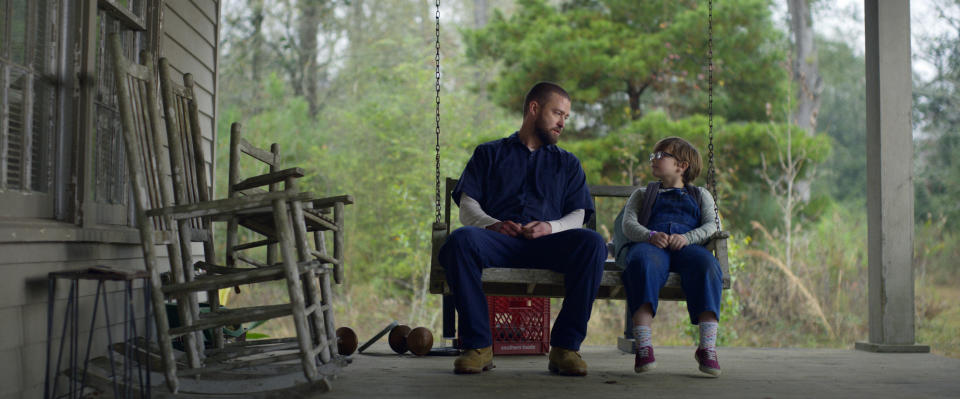 This image released by Apple shows Justin Timberlake, left, and Ryder Allen in a scene from “Palmer.” (Apple via AP)