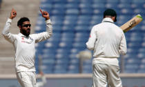 Cricket - India v Australia - First Test cricket match - Maharashtra Cricket Association Stadium, Pune, India - 23/02/17. India's Ravindra Jadeja celebrates the wicket of Australia's Peter Handscomb. REUTERS/Danish Siddiqui