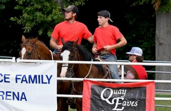 Canton High School football player Gavin Otto (on right, aboard Disco), with his brother, Evan (on left, aboard Gunner) at a National Flag Racing Association event in the Midwest.