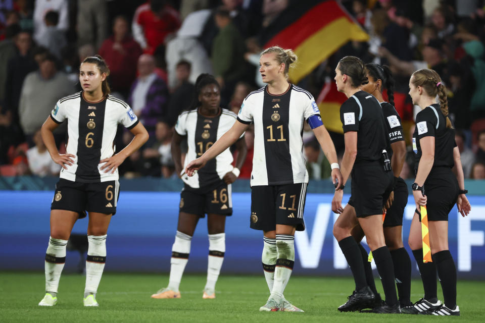 Germany's Alexandra Popp, centre, reacts with her teammates following the Women's World Cup Group H soccer match between South Korea and Germany in Brisbane, Australia, Thursday, Aug. 3, 2023. (AP Photo/Tertius Pickard)