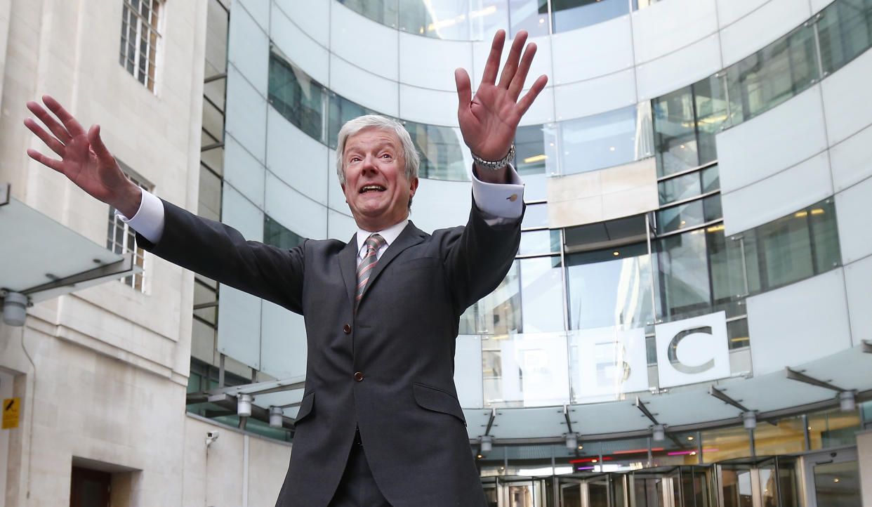 Tony Hall poses for photographers on his arrival at Broadcasting House for his first day as the new Director General of the BBC, in central London April 2, 2013.  REUTERS/Andrew Winning (BRITAIN - Tags: ENTERTAINMENT MEDIA SOCIETY)