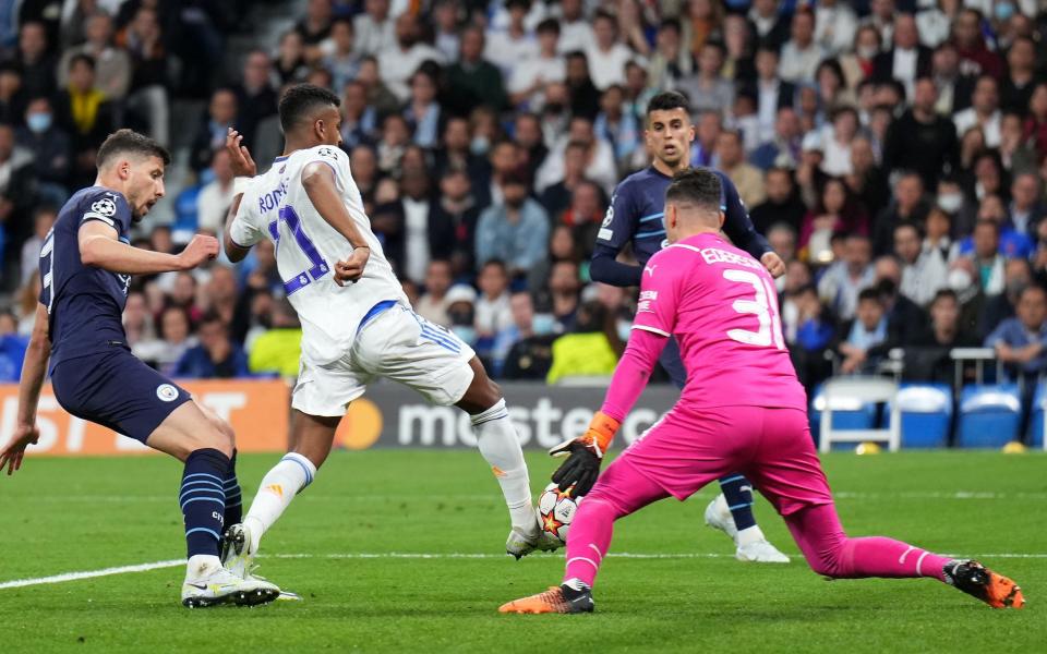 Rodrygo of Real Madrid celebrates after scoring their sides first goal during the UEFA Champions League Semi Final Leg Two match between Real Madrid and Manchester City at Estadio Santiago Bernabeu - Angel Martinez/Getty Images