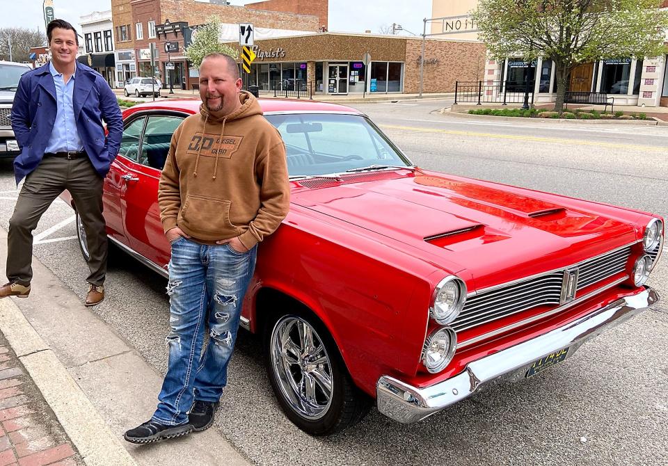 Joey Myers, right, looks forward to Friday’s classic car show where he plans to bring this ‘67 Mercury Comet Caliente, as well as a ‘65 Chevy Suburban and a ‘66 Chevy C10. On the left is Ryan Conrod, event coordinator for Sturgis DDA.