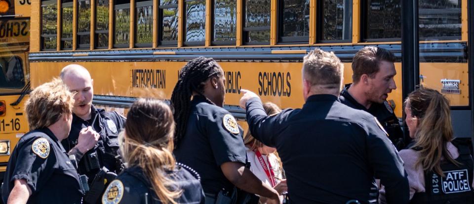 nashville, tn march 27 school buses with children arrive at woodmont baptist church to be reunited with their families after a mass shooting at the covenant school on march 27, 2023 in nashville, tennessee according to initial reports, three students and three adults were killed by the shooter, a 28 year old woman the shooter was killed by police responding to the scene photo by seth heraldgetty images