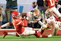 MIAMI, FLORIDA - FEBRUARY 02: Patrick Mahomes #15 of the Kansas City Chiefs is tackled by Jimmie Ward #20 of the San Francisco 49ers during the first quarter in Super Bowl LIV at Hard Rock Stadium on February 02, 2020 in Miami, Florida. (Photo by Andy Lyons/Getty Images)