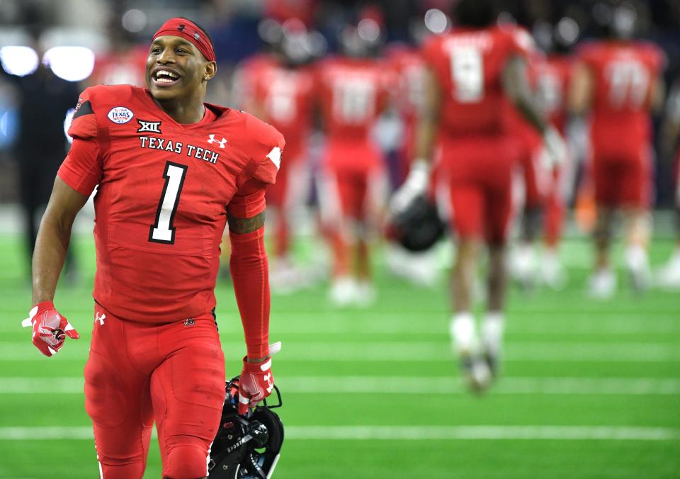 Texas Tech receiver Myles Price (1) celebrates the Red Raiders' 42-25 Texas Bowl victory against Mississippi on Wednesday night at NRG Stadium. Tech finished with an 8-5 record and ended the season on a four-game win streak for the first time in 27 years.