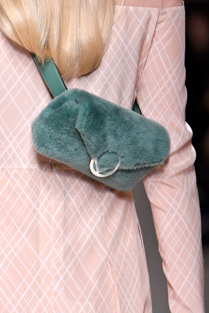 <p>A blue, furry, crossbody bag from the Fendi FW18 show. (Photo: Getty Images) </p>
